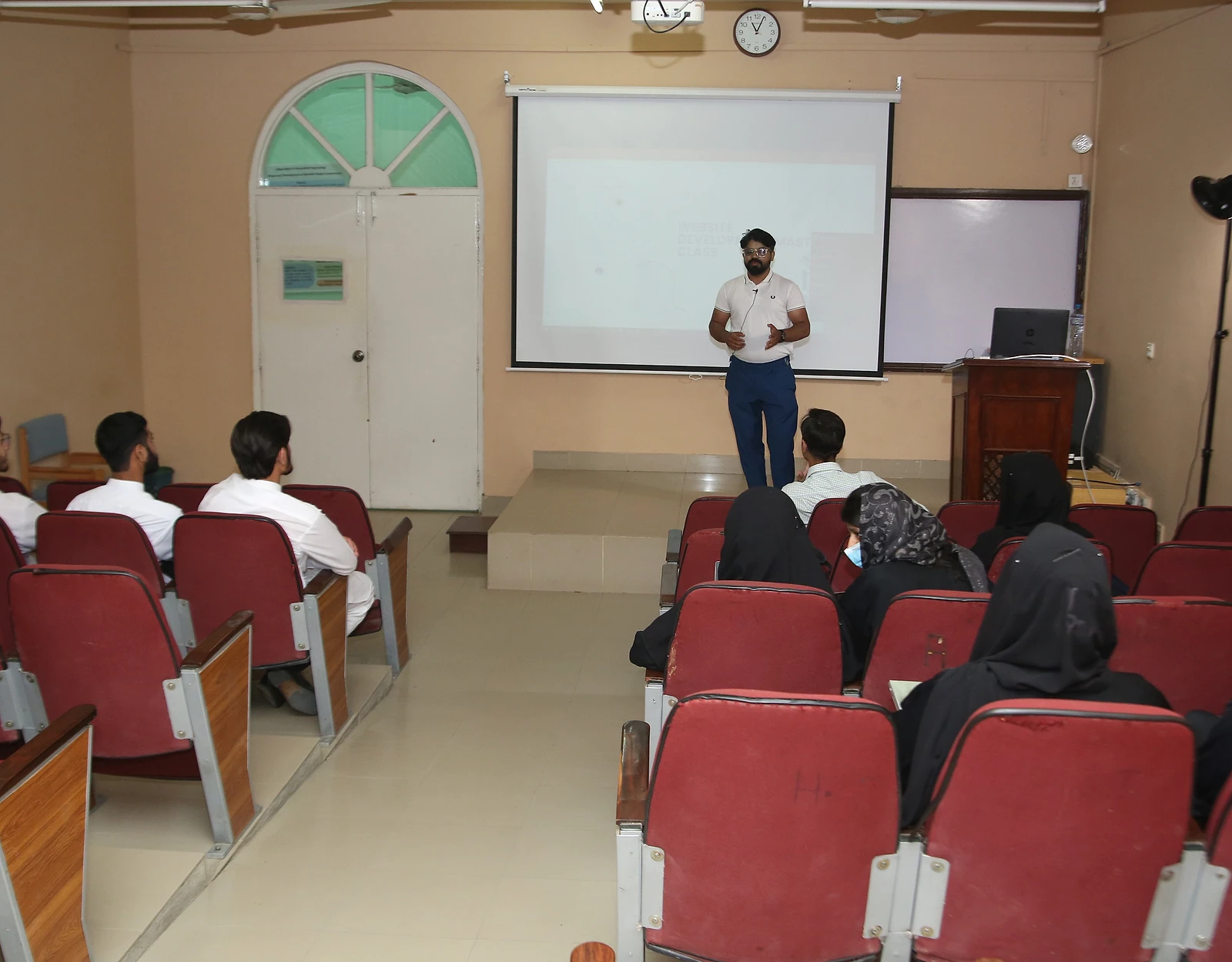 Muhammad Awais lecturing on web development and AI at Riphah International University